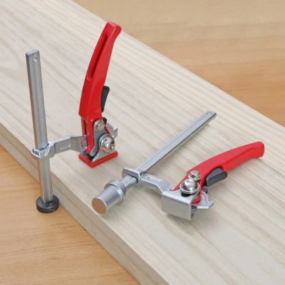 Serre joint de rail pied