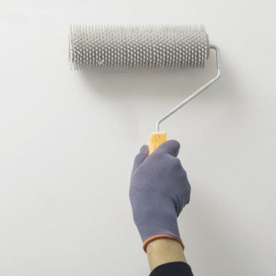 Rouleau-peinture-Debulleur-mur