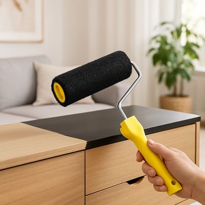 Rouleau peinture a mastic noir meuble