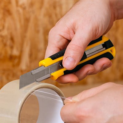 Cutter Olfa jaune tape