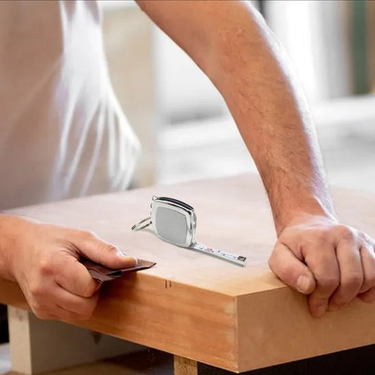 Mètre ruban porte clés table